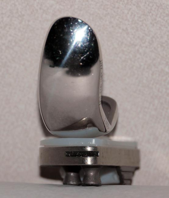 A partial knee replacement implant. 